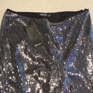 Never worn sequined flare pants!